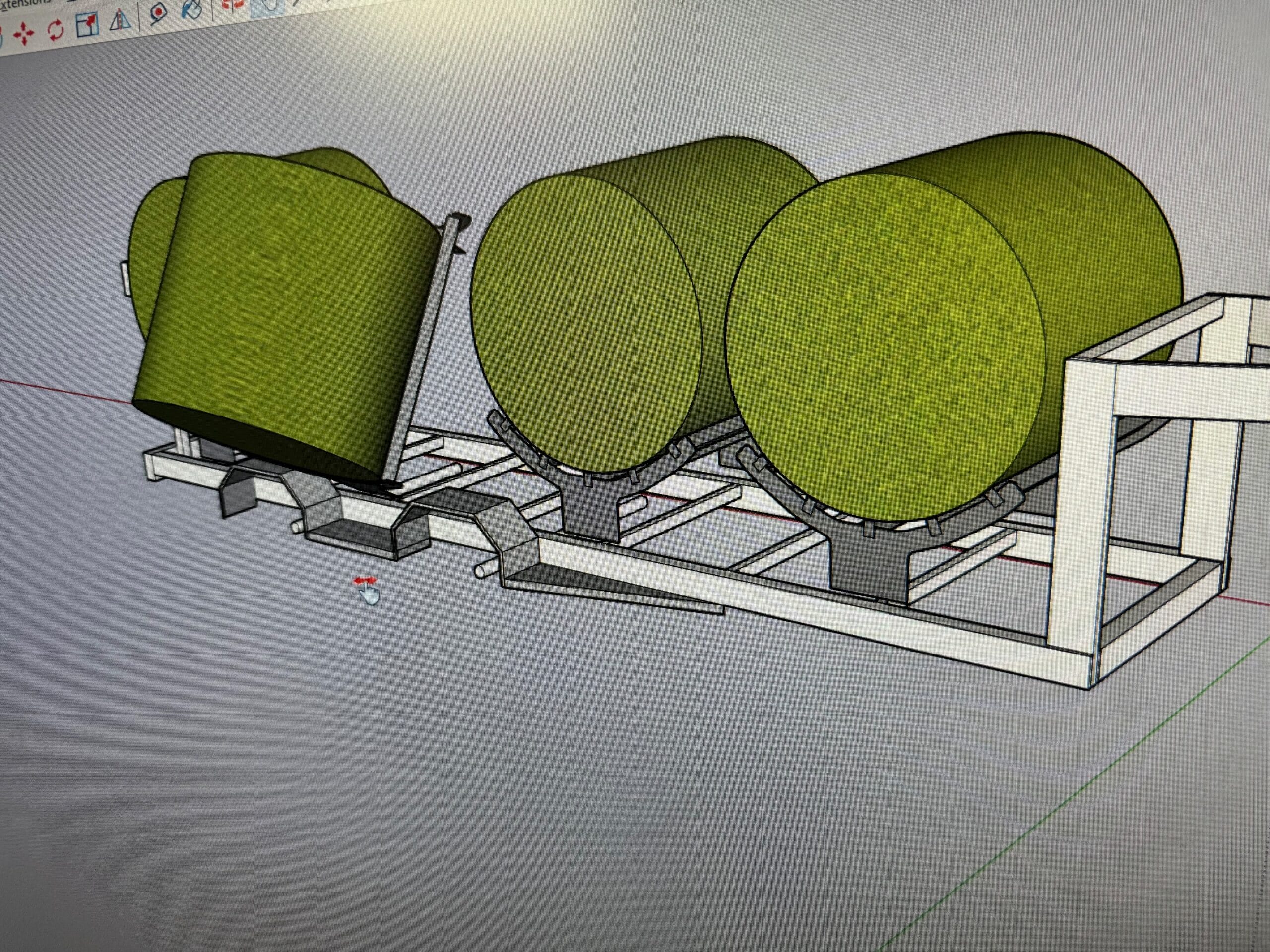 A cad drawing showing green cylinders representing hay bales, positioned on an axis from bottom left to top right, resting on the representation of a mechanical trailer. The trailer is depicted with gray parallel beams , one along the front and one along the back face of the cylinders. These parallel beams supporting the cylinders terminate with vertical beams connected at the top and bottom with another pair of beams that are parallel to each other at the top and bottom of the vertical beams. Another pair of beams are attached to the top of the vertical beams and are parallel to each other and to the beams at the base of the structure. The drawing shows semi-cylindrical cradles under each green bale that hinge along the front supporting beam (first mentioned), to tilt the bales at an angle and dump them on a field..