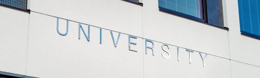 photo of a sign that says university